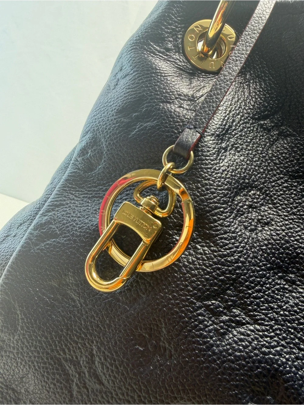 Louis Vuitton blue Monogram Empreinte Leather Shoulder Bag with Gold Hardware